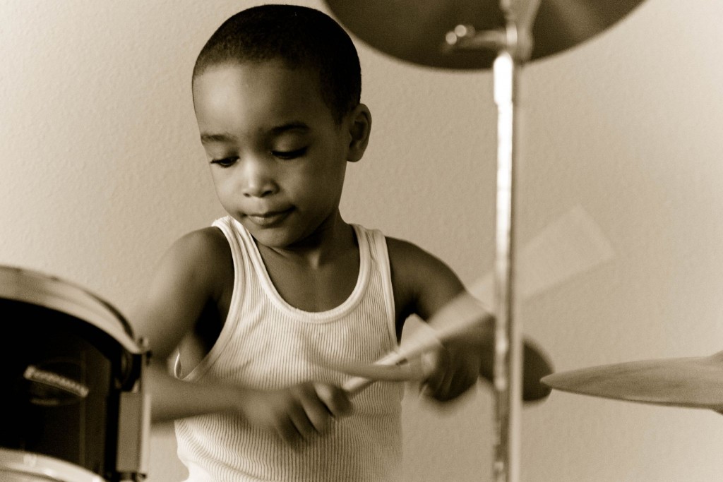 No AI here: Young drummer creates relevant rhythms. Photo by Jeff Moore https://creativecommons.org/licenses/by-nc-nd/2.0/